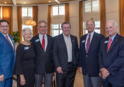 Gabriel Delgado, Mary Cone, Bill Penney, Speaker Ken H. Johnson, PhD, Bob Morgan, and Jim Stanley.